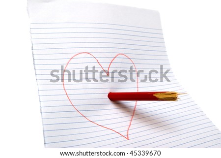 Broken heart with a broken pencil on paper. White background