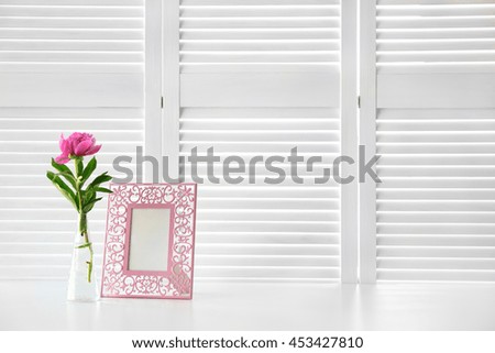 Beautiful peony flower on white folding screen background