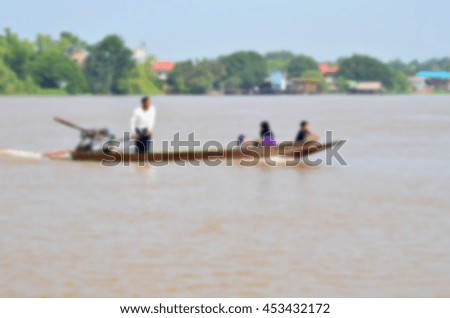 Blurred abstract background of boat in river