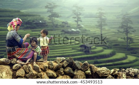 Family tribal mother and children girls. Royalty-Free Stock Photo #453493513
