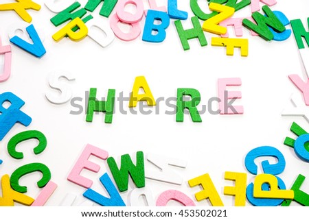 colorful wooden letter with white background
