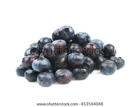 Pile of ripe bilberries isolated over the white background