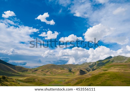 Beautiful sky with clouds over hills