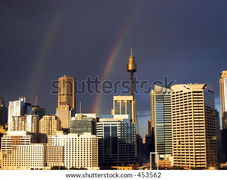 City skyline with rainbows