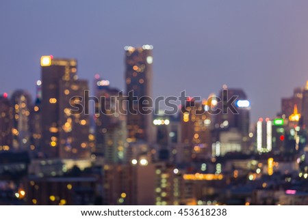 Blurred bokeh light night view, city and office, abstract background