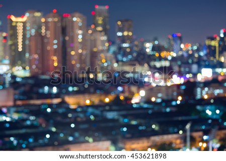 Abstract blurred lights night view, big city downtown and office building 