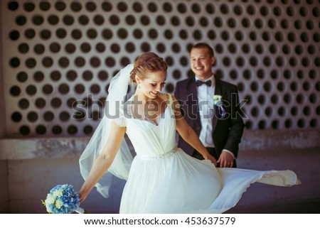 smiling bride dancing for her beloved