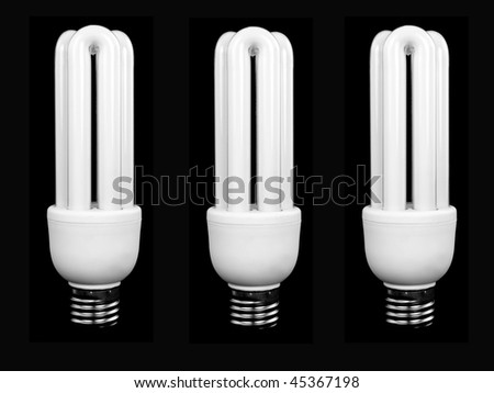 An energy saving light bulbs isolated against a black background