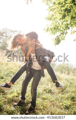 young couple have fun free time on a sunny day