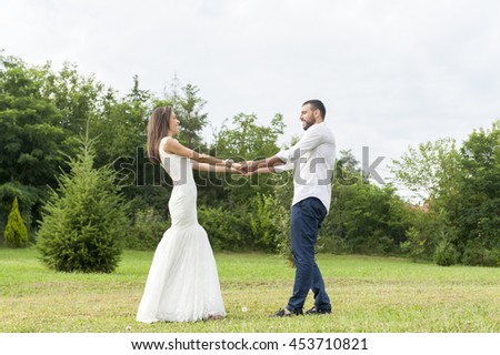 Happy bride and groom on their wedding. Wedding couple outdoor