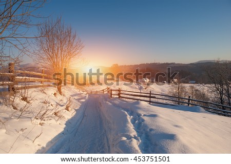 rural winter road covered by snow. natural background. vintage picture