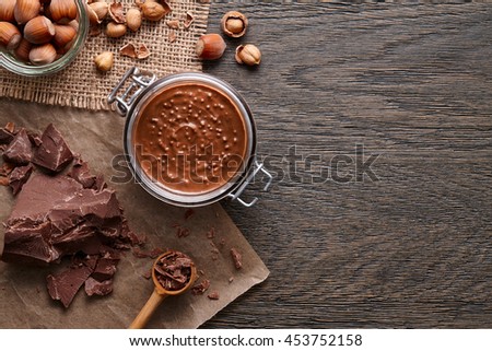Background with hazelnut spread and ingredients