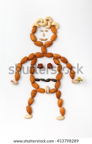 Mix nuts on white background. Composition of nuts, flat lay - concepts about decoration, healthy eating and food background