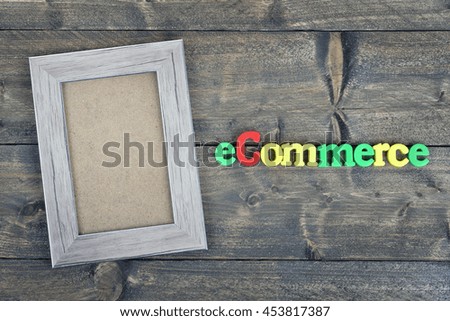 Ecommerce word on wooden table