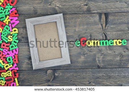 Ecommerce word on wooden table