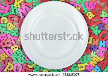 Many letters and white plate 