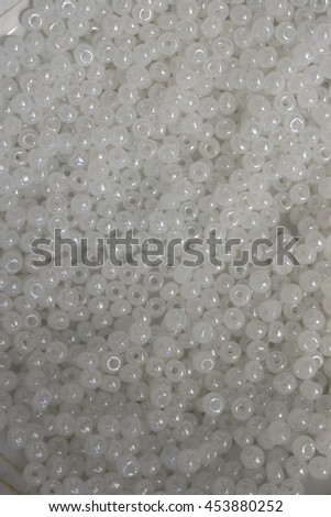 This is a photograph of Pearl White seed beads