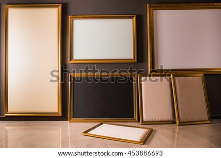 Empty photograph frames in gallery