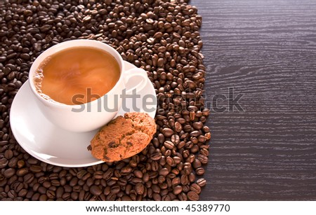 white coffee and coffee beans on the table