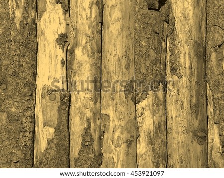 Old wood logs or plank board background vintage sepia