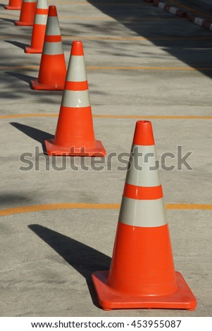 Orange Traffic Cones at Parking Spaces