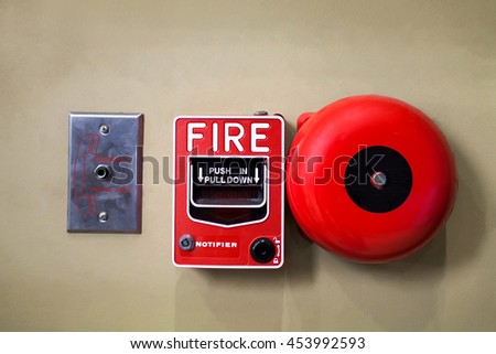 Fire alarm switch on old wall 
