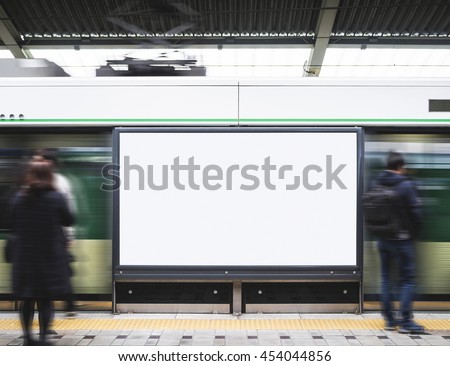 Blank Billboard Banner Light box in Subway station with blurred people Travel Royalty-Free Stock Photo #454044856