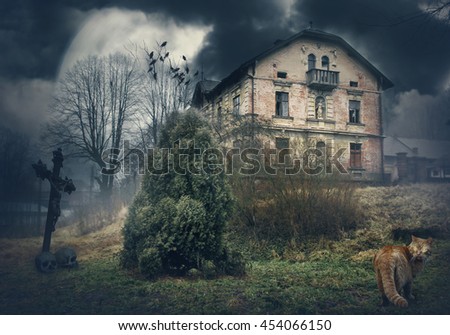 Dark mysterious Halloween landscape with old abandoned house
