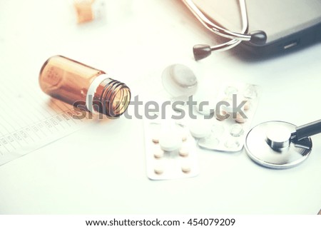 Doctor table with medical items. Flat lay