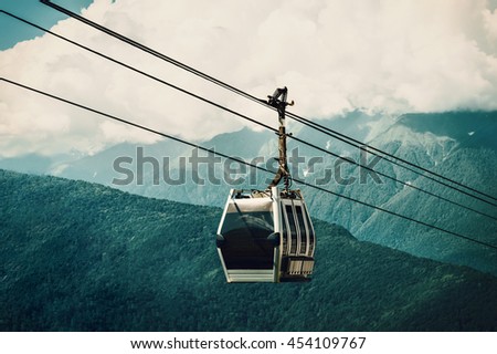 Cableway in the mountains.Beautiful Mountain View. Russia,Sochi,Krasnaya Poliana. Royalty-Free Stock Photo #454109767