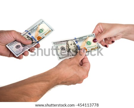 Man giving dollar bills to woman on a white background. Close up