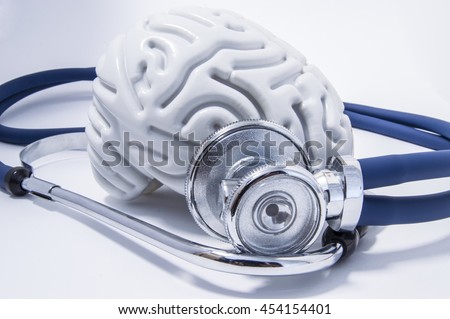 The figure of the human brain with a stethoscope or phonendoscope around him. Picture for medical neurological examinations or surveys