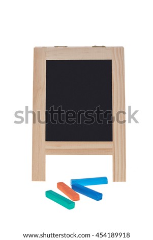 black board with multicolored  chalk isolated on white