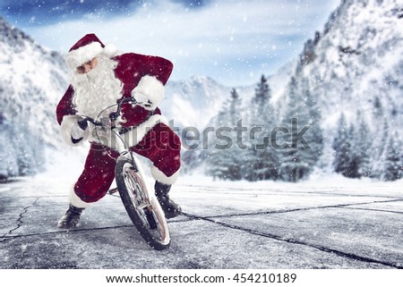 xmas time and santa claus on bike 