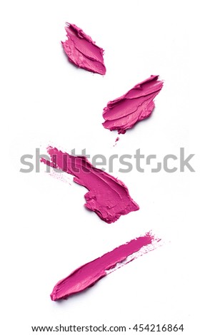 Smudged pink color lipstick on background