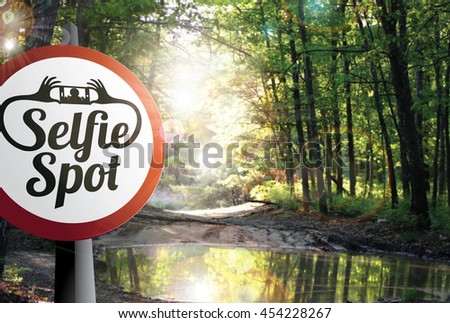 Selfie Spot sign in scenic landscape.