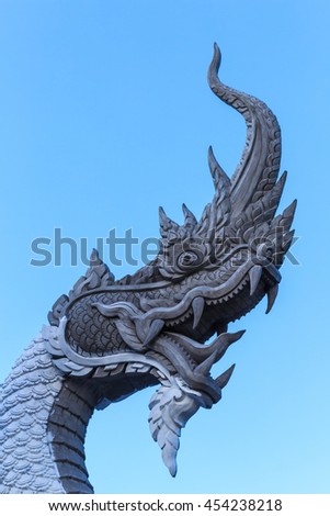 serpent statue on blue sky background