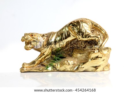 Tiger ceramic gold isolated on a white background.