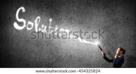 Woman with flashlight in hand