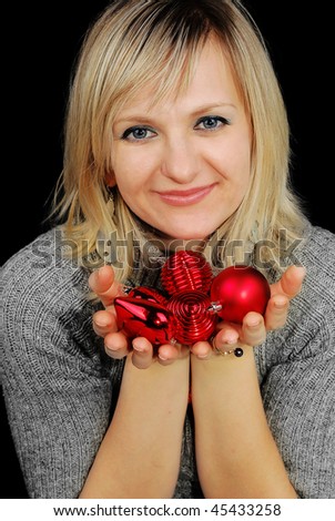 Some nice beautiful young Caucasian  lady with blue eyes and christmas decoration closeup. Studio Shoot.