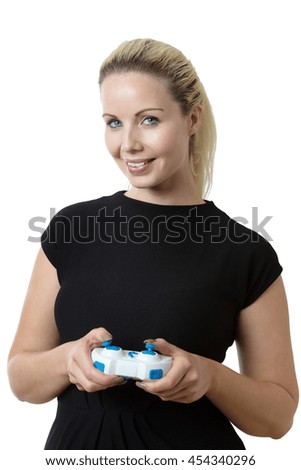 business woman holding a game controller playing a game