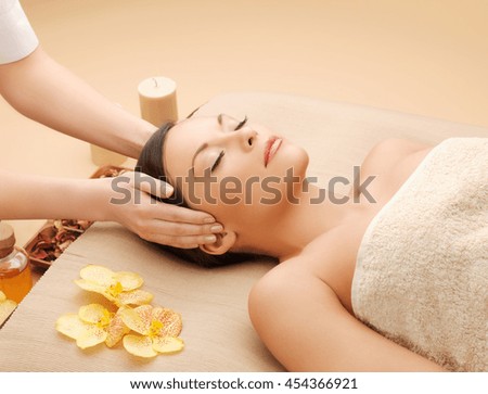 picture of calm beautiful woman in massage salon