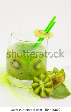 Fresh kiwi fruit with kiwi juice for a healthy dessert