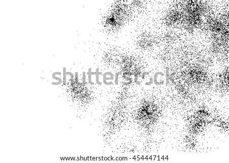 Silhouette of flakes spread on the flat surface. Top view of dust, sand blow or crumbs. Abstract grainy texture isolated on white background.