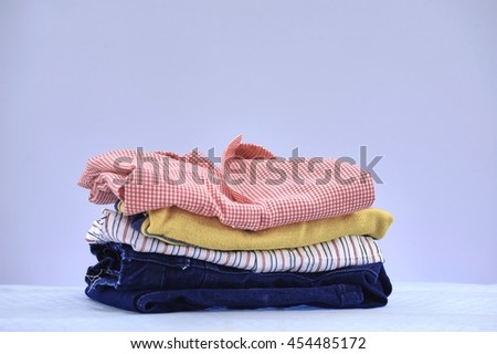 A studio photo of ironing and laundry items