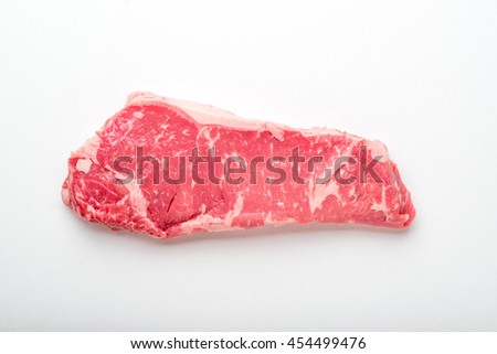 raw new york strip steak Royalty-Free Stock Photo #454499476