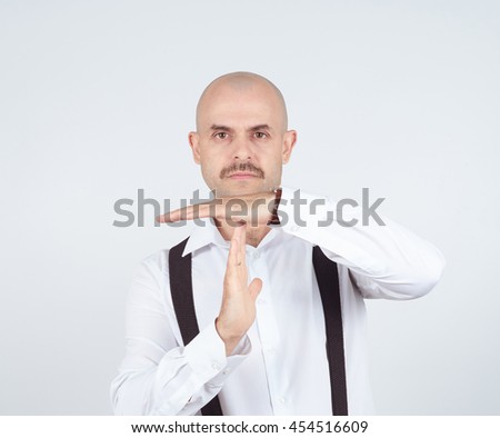 bald man showing time out hands gesture isolated
