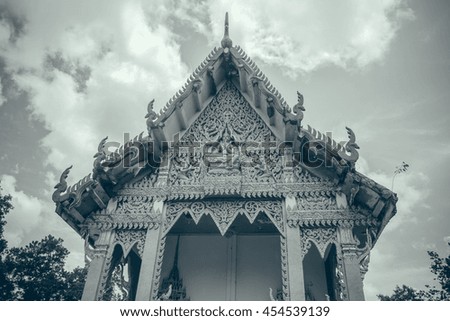 Old thai temple in black and white picture style,Roof gable Golden Thai style temple.