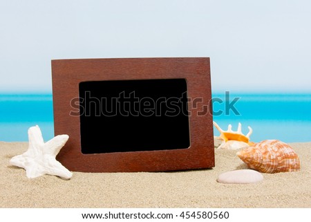 Pictures frame on the beach
