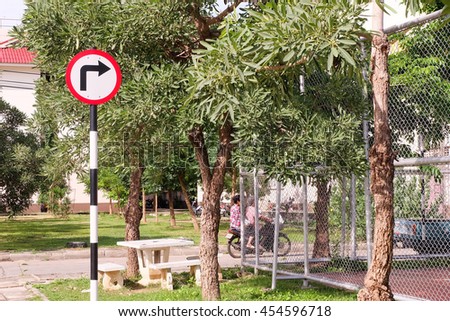 Road signs in park.
